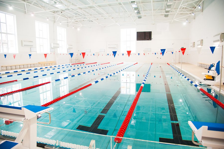 interior of public swimming pool. Lanes of a competition swimming pool