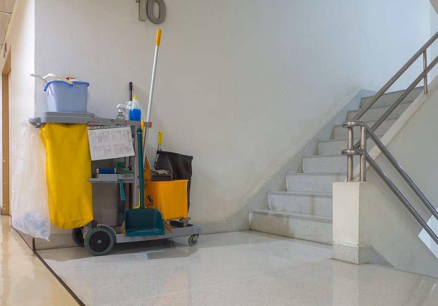 Cleaning tools cart wait for cleaner.Bucket and set of cleaning equipment in the apartment. janitor service janitorial for your place. Concept of service, worker and equipment for cleaner