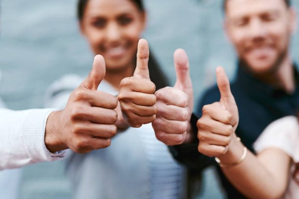 Image of workers showing approval